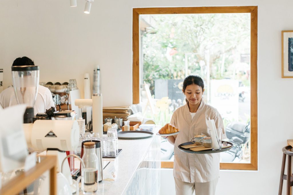 A woman will serve breakfast