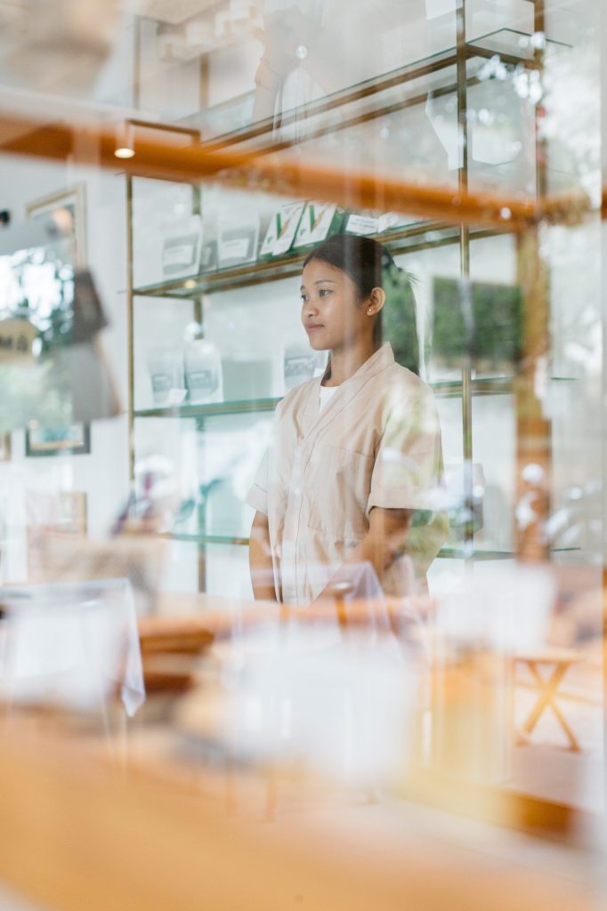 A woman is standing in Ame Bistro & Coffee
