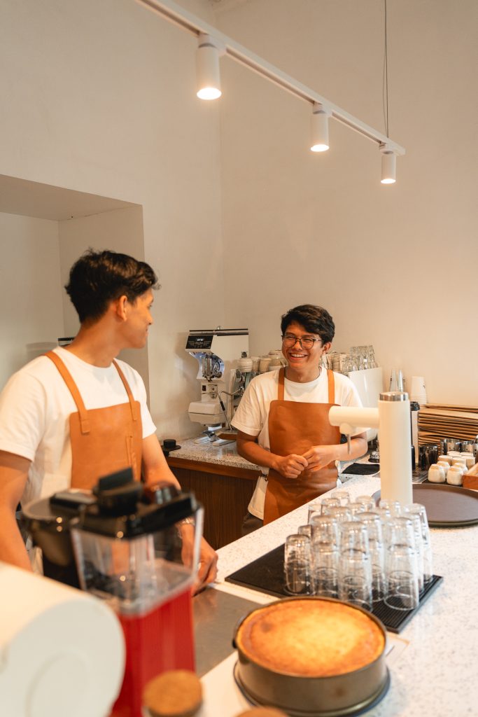 Two baristas are talking