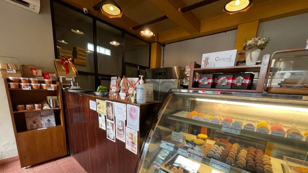 Caramel Patisserie and Cafe dessert display in Ubud
