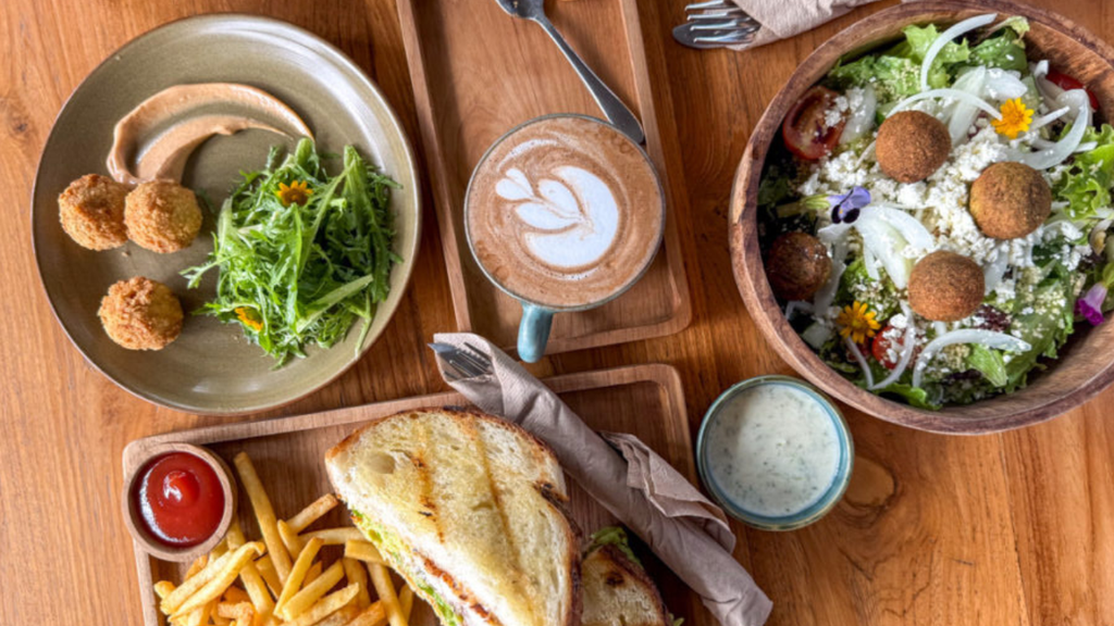 Assorted breakfast and brunch dishes served with eggs, vegetables, and freshly prepared sides